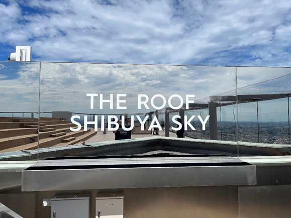 Sign saying "The Roof Shibuya Sky"
